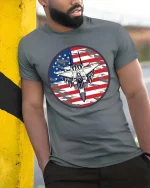 American Fighter Jet Patriotic Aviation Graphic Cool Tshirt - model wearing grey tee, leaning on column