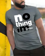 No Thing Impossible Motivational Typography Success Mindset Tshirt - model wearing grey tee, leaning on column