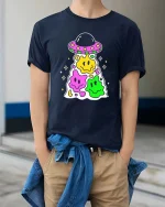 Cute UFO Smiley Alien Kawaii Cartoon Graphic T Shirt - model wearing navy tee with hands in pockets