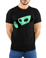 Peeking Alien Funny UFO Extraterrestrial Graphic T Shirt - model wearing black tee with hands behind back