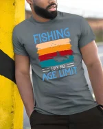 Fishing Has No Age Limit Vintage Sunset Graphic T Shirt - model wearing grey tee, leaning on column