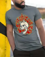 Vintage Burning Skull Flame Retro Graphic T Shirt - model wearing grey tee, leaning on column