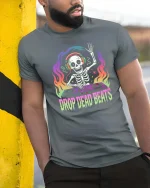 Drop Dead Beats Skeleton DJ Neon Music Graphic t-shirt - model wearing grey tee, leaning on column