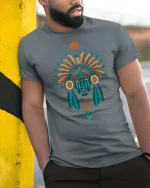Tribal Chief Feather Headdress Graphic t-shirt Premium - model wearing grey tee, leaning on column
