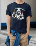 Funny Grim Reaper Love Finger Gothic Humor Graphic Tshirt - model wearing navy tee with hands in pockets