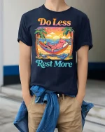 Do Less Rest More Cat Relaxing Beach Funny Graphic T-Shirt - model wearing navy tee with hands in pockets