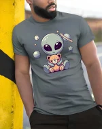 Cute Alien Teddy Bear Space Cartoon Kawaii Graphic T-Shirt - model wearing grey tee, leaning on column