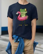 Funny Frog Flamingo Pool Float Cartoon Summer Tshirt Gift - model wearing navy tee with hands in pockets