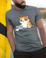 Funny Lazy Cat Working On Laptop Coffee Cartoon Tshirt - model wearing grey tee, leaning on column
