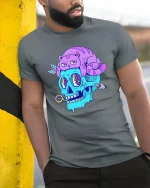 Trippy Skull With Lazy Cat Weird Surreal Cartoon Tshirt - model wearing grey tee, leaning on column