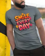 Smile Every Day Positive Quote Graphic T-Shirt Happy Tee - model wearing grey tee, leaning on column