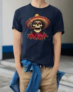 Mexican Skull Sombrero Smoking Cigar Roses Graphic T Shirt - model wearing navy tee with hands in pockets