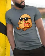 Funny Potato Eating Chips Cool Cartoon Snack Lover T Shirt - model wearing grey tee, leaning on column