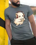 Cute Ghost Gamer Headphones Retro Console Fun T Shirt - model wearing grey tee, leaning on column