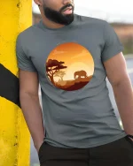 African Elephant Sunset Safari Nature Wildlife Graphic T Shirt - model wearing grey tee, leaning on column