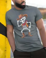 Funny Skeleton Cowboy Western Dance Vintage Graphic T Shirt - model wearing grey tee, leaning on column