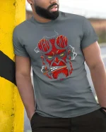 Hellboy Demon Skull Smoking Cigar Dark Graphic T Shirt - model wearing grey tee, leaning on column