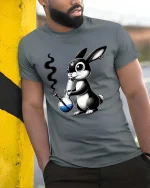 Funny Bunny Smoking Bong Cartoon Graphic T Shirt Tee - model wearing grey tee, leaning on column