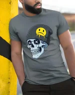 Edgy Skull Beanie Sad Smiley Graphic T Shirt Street Tee - model wearing grey tee, leaning on column