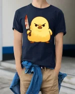 Funny Angry Chick Knife Cartoon Tshirt Dark Humor Graphic Tee - model wearing navy tee with hands in pockets