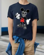Retro Cartoon Skull Mouse Tshirt Dark Streetwear Graphic Tee - model wearing navy tee with hands in pockets