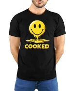 Funny Melted Smile Cooked Tshirt Drip Emoji Graphic Tee - model wearing black tee with hands behind back