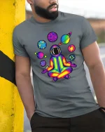 Rainbow Astronaut Meditation Tshirt Cosmic Yoga Graphic Tee - model wearing grey tee, leaning on column