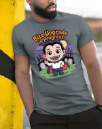 Funny Bite Upgrade in Progress Vampire Tshirt Tee - model wearing grey tee, leaning on column