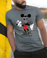 Retro Cartoon Skull Mouse Tshirt Dark Streetwear Graphic Tee - model wearing grey tee, leaning on column