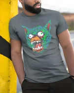 Neon Rage Wolf Face Graphic Tshirt Streetwear Style - model wearing grey tee, leaning on column
