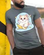 Cute Banana Cat Kawaii Funny Cartoon Graphic Tshirt - model wearing grey tee, leaning on column