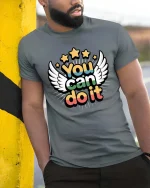 You Can Do It Motivational Wings Stars Positive Quote Tshirt - model wearing grey tee, leaning on column