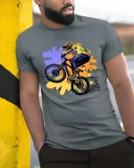 BMX Rider Stunt Urban Street Freestyle Bike Graphic Tshirt - model wearing grey tee, leaning on column