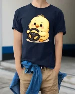 Cute Baby Chick Driving Wheel Cartoon Graphic Tshirt Fun - model wearing navy tee with hands in pockets