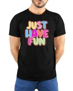 Just Have Fun Tshirt Colorful Positive Quote Graphic Tee - model wearing black tee with hands behind back