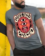 Safe Boy Psycho Retro Trippy Graphic Statement Tshirt - model wearing grey tee, leaning on column